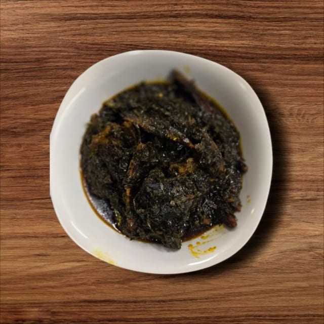 Eru Soup with Yam Fufu or Garri.
