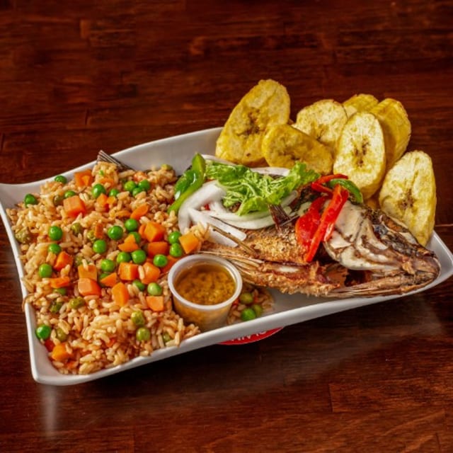 Whole Fried Fish with Plantains or Jollof Rice.