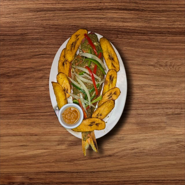 Grilled Fish with Fried Plantains or Jollof Rice.